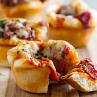 Pizza Cups with a bite taken from one.
