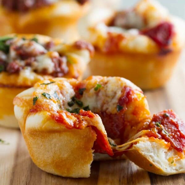 Pizza Cups with a bite taken from one.