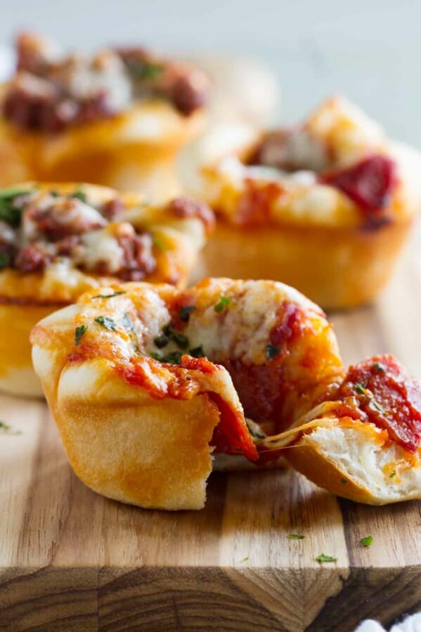 Pizza Cups with a bite taken from one.
