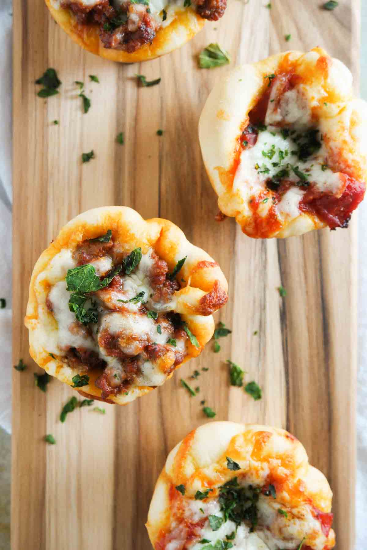 Overhead view of pizza cups made from frozen roll dough.
