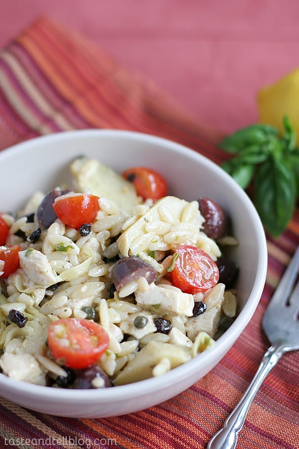 Mediterranean Pasta Salad in a bowl with a fork next to it.