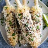 Elotes stacked on a plate