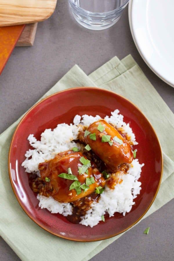 Slow Cooker Honey Garlic Chicken - chicken thighs are slow cooked in an easy honey garlic sauce, then served over rice. This proves that dinner doesn’t have to be complicated to be good!