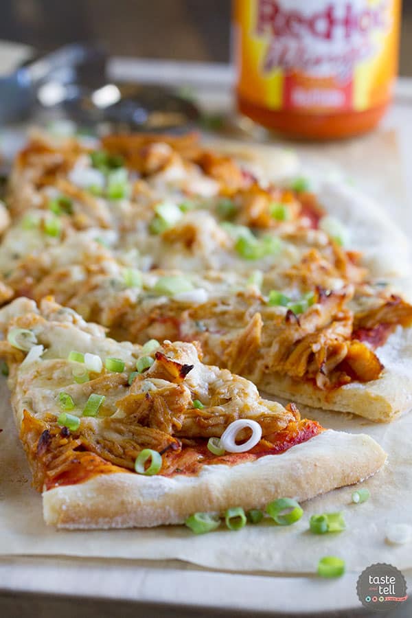 Spice up your pizza night with this Buffalo Chicken Pizza that has buffalo sauced chicken, Monterey Jack cheese and blue cheese.