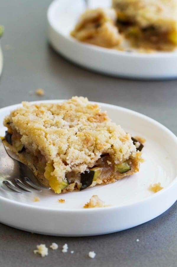 Zucchini Cobbler Bar on a plate with a fork