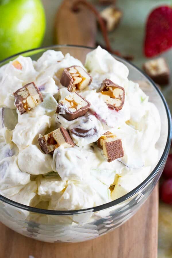 Snickers Salad - sweet salad with snickers, apples, and grapes.