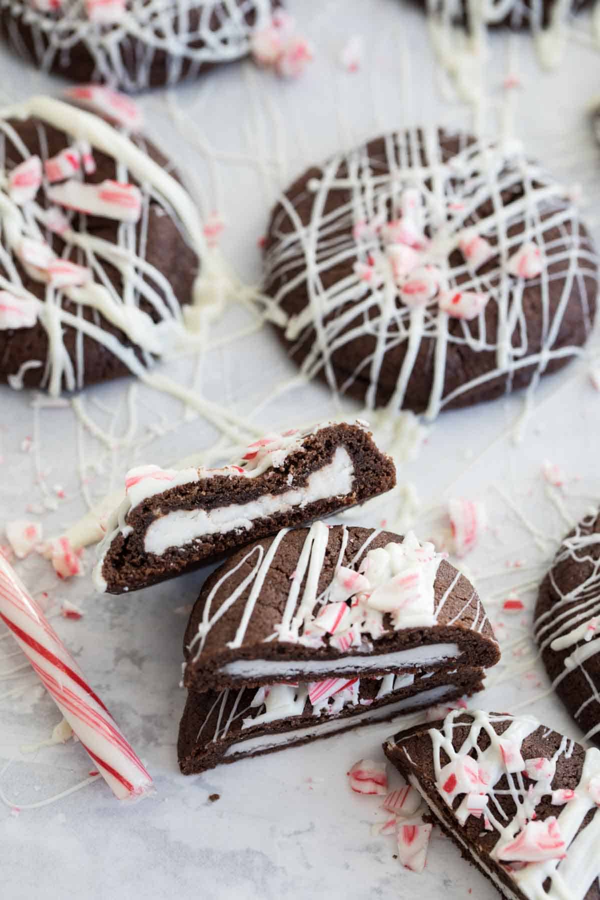 Chocolate Peppermint Cookies recipe with cookie sliced in half to show peppermint patty on the inside.