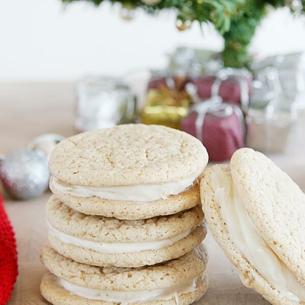 Christmas Ginger Cookies - Lightly spiced ginger cookies are filled with a maple cream cheese filling for the perfect Christmas cookie.