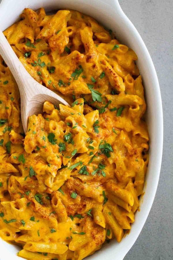The ultimate comfort food, this Pumpkin Cheddar Mac and Cheese is the perfect way to add a pumpkin twist to this dinner that is perfect for cold, chilly nights.