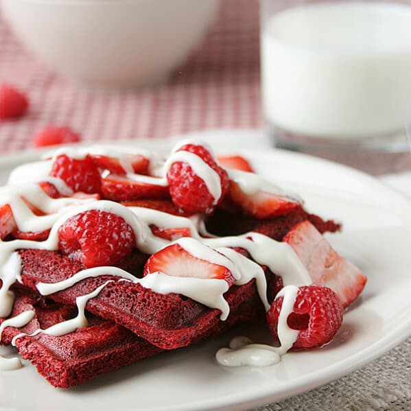 Red Velvet Waffles with Cream Cheese Drizzle | www.tasteandtellblog.com