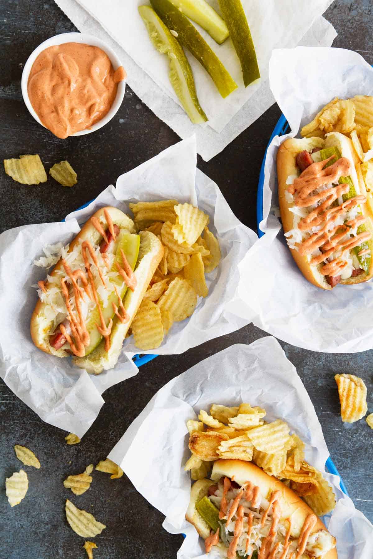 Reuben hot dogs in baskets with potato chips