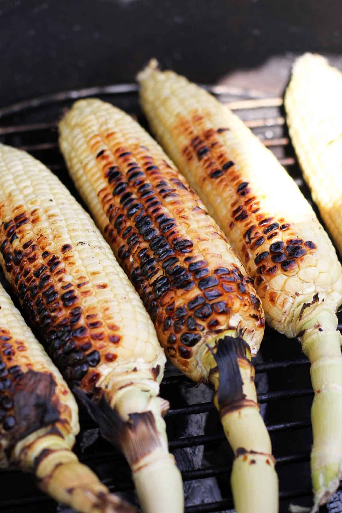 corn grilling on a charcoal grill
