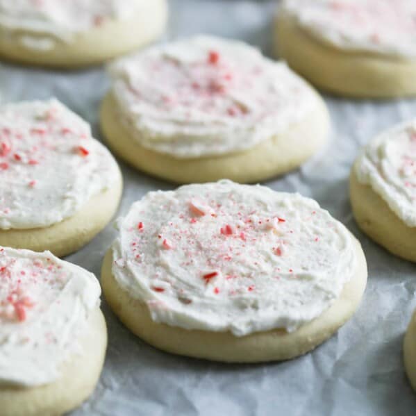 Best soft sugar cookie recipe with peppermint on a piece of parchment paper.