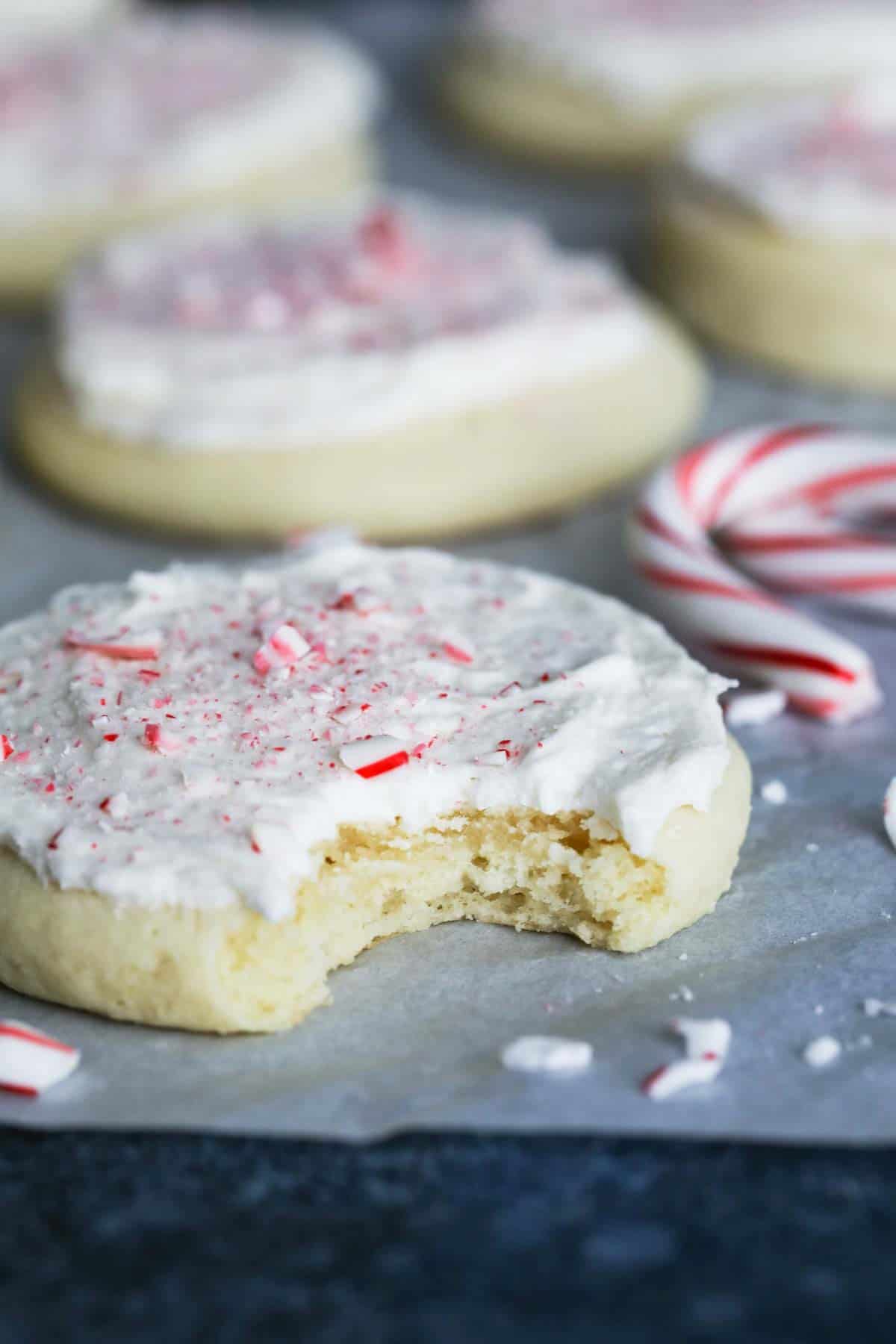 Soft Cut Out Peppermint Sugar Cookie Recipe with buttercream and candy canes.