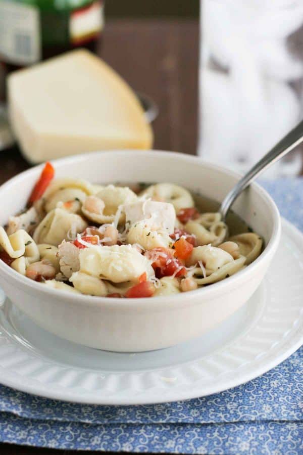 Perfect for a cold night, this Easy Chicken Tortellini Soup is filled with chicken, bean and tortellini, and is done in no time!