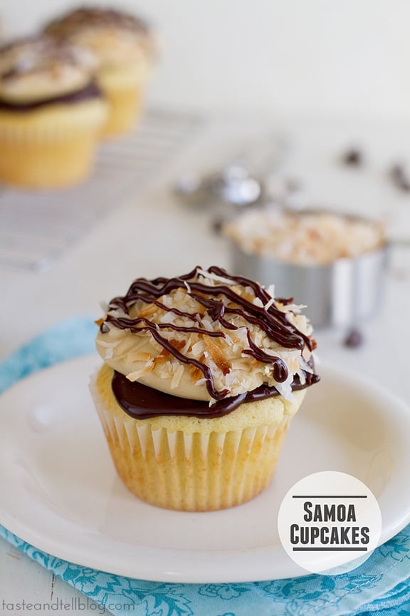 Samoa Cupcake - a yellow cupcake filled with caramel and topped with chocolate ganache, caramel buttercream and toasted coconut | www.tasteandtellblog.com