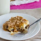 Caramel Cookie Cheesecake Bar with a bite taken from it.