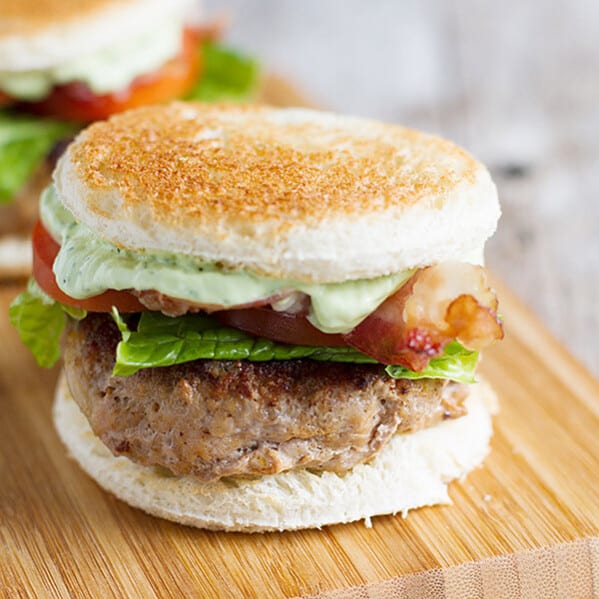 These Club Burger Sliders are slider sized turkey burgers topped with bacon, lettuce, tomatoes and an avocado-ranch dressing.