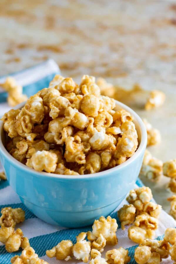 Baked Caramel Popcorn in a blue bowl