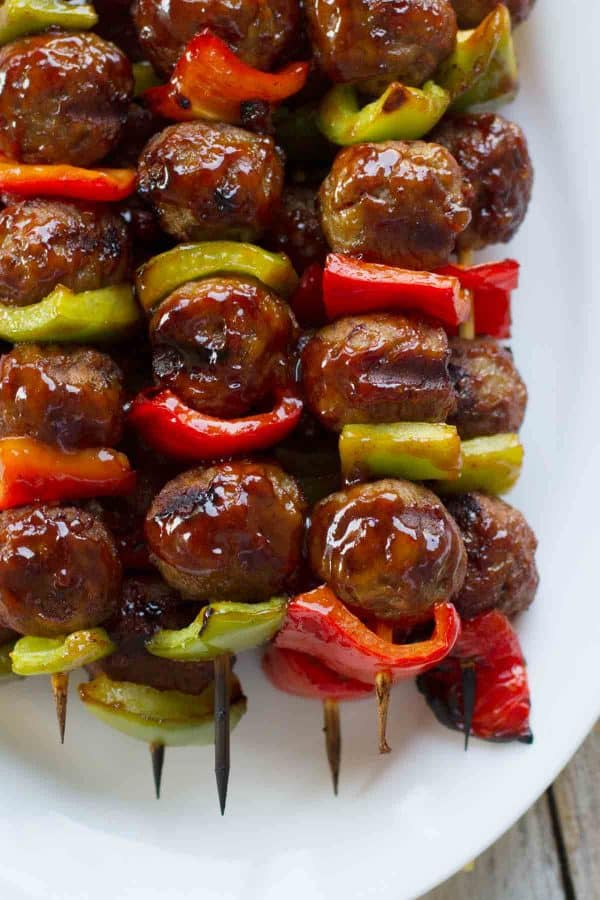 These easy Sweet and Sour Meatball Skewers are made from frozen meatballs that are combined with fresh peppers and basted with an easy sweet and sour sauce.
