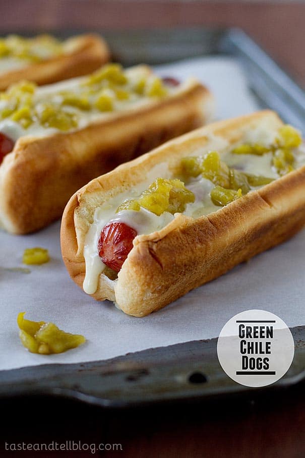 These hot dogs take a New Mexican turn – topped with a green chile cheese sauce and lots of diced green chiles.