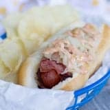 Pastrami Wrapped Hot Dog in a basket.