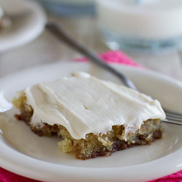 Filled with cinnamon, spice and everything nice, this Cinnamon Roll Sheet Cake is super tender and moist and addictive!