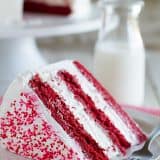 slice of red velvet ice cream cake on a plate.