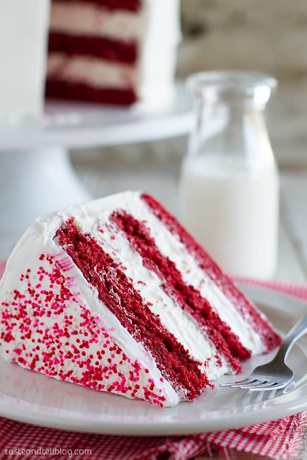 Slice of red velvet ice cream cake on a plate.