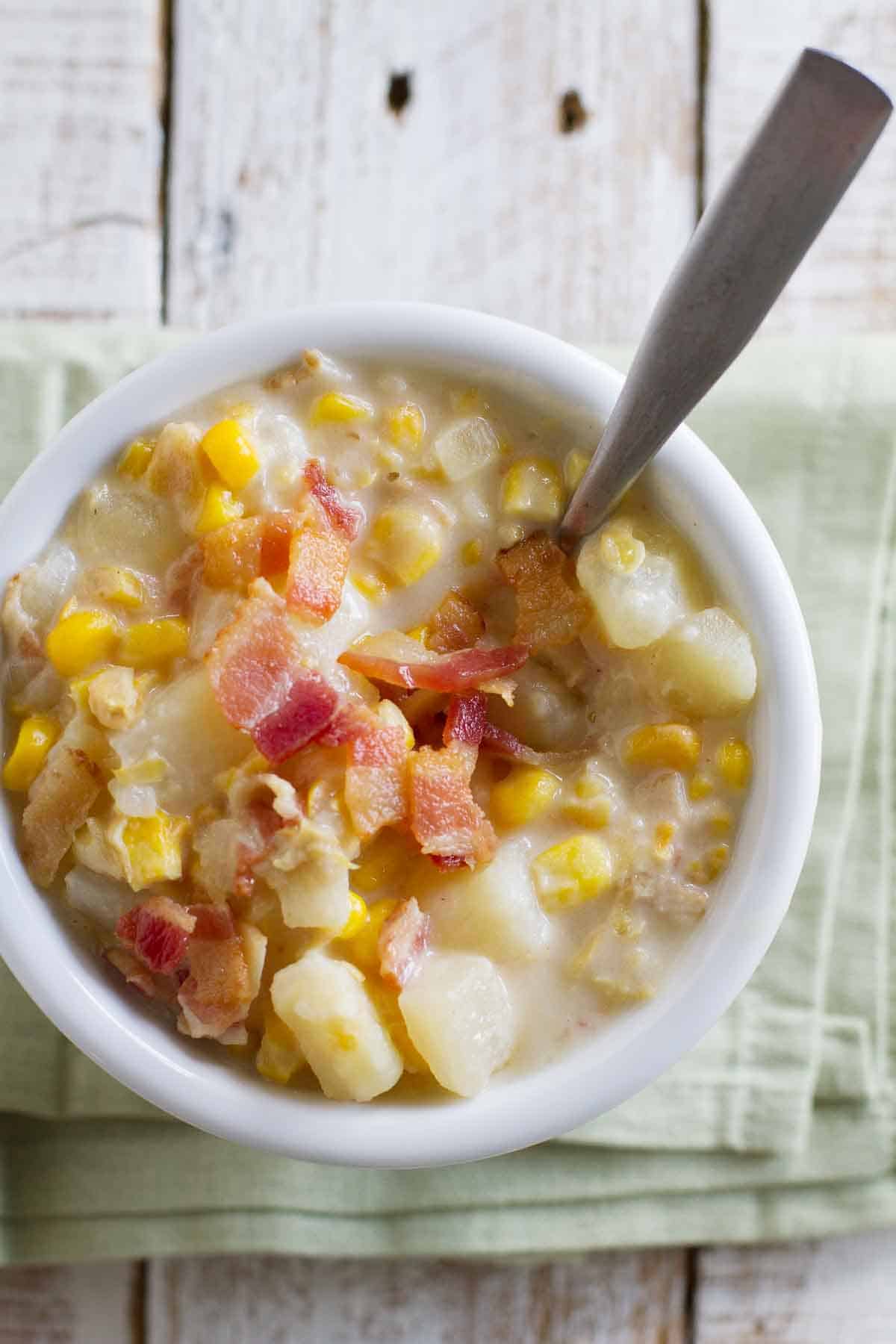 Easy Crockpot Corn Chowder recipe with corn, bacon, and potatoes.