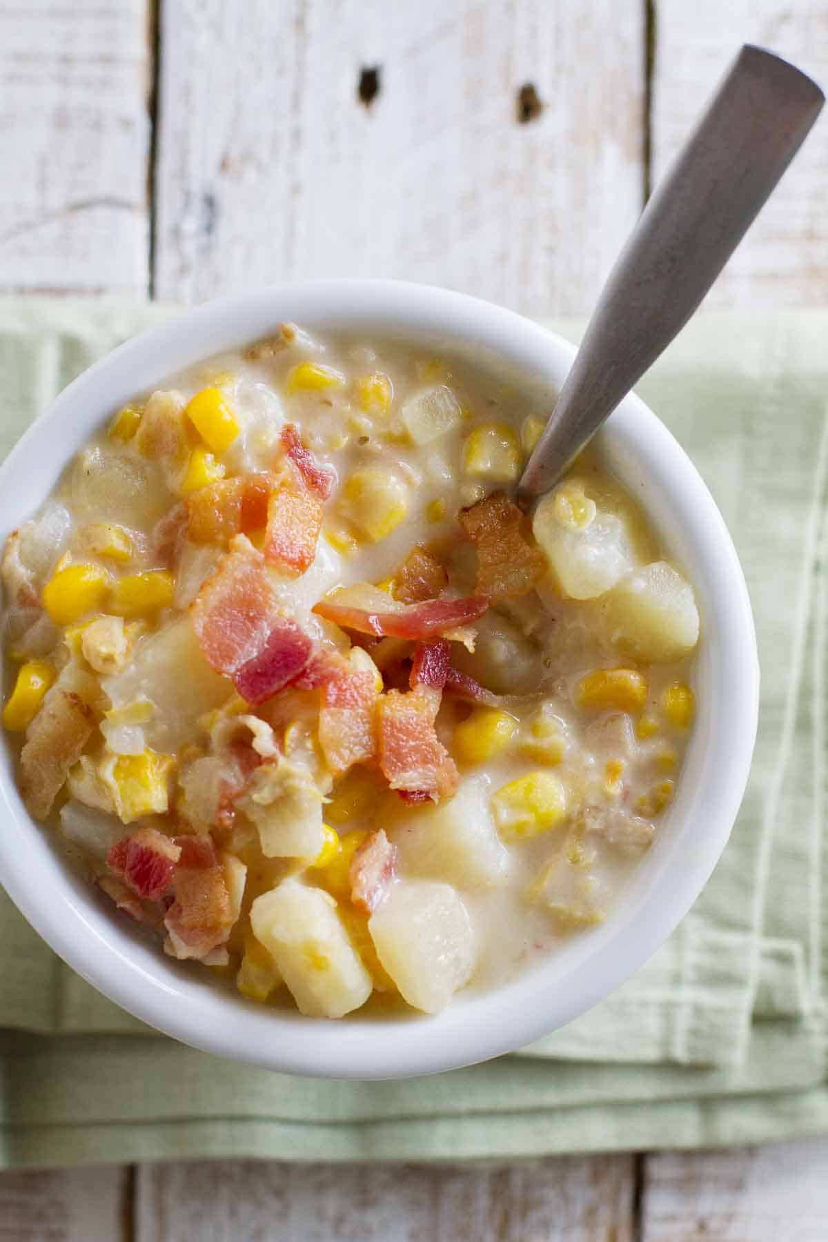 Easy Crockpot Corn Chowder recipe with corn, bacon, and potatoes.