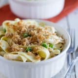 This Garlic Parmesan Chicken Pasta is made easy by using precooked, shredded chicken. A garlic parmesan sauce coats the chicken and homestyle noodles in this fast and comforting casserole.