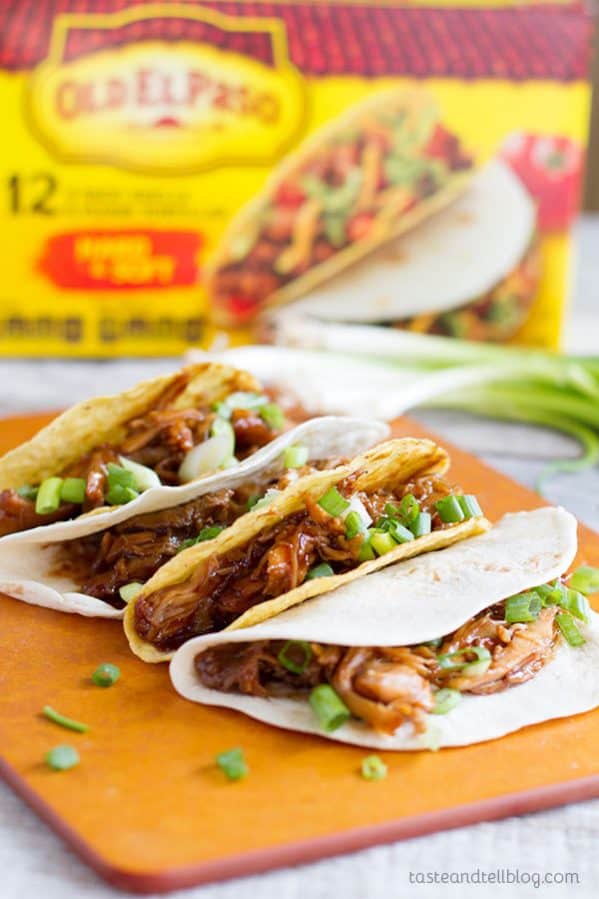 Honey Garlic Chicken Tacos - Chicken thighs are slow cooked in a honey, soy and garlic mixture, then shredded for a fun Taco Tuesday.