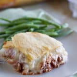 A play on lasagna, this Mock Lasagna is an easy weeknight dinner with ground beef, lots of cheese and crescent rolls is a family favorite.