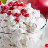 Jazz up that fruit salad recipe with this Apple Pomegranate Salad that has sweetened whipped cream with apples, marshmallows, and lots of fresh pomegranate seeds.
