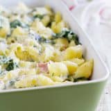 This kid-friendly Creamy Shells and Ham Casserole has pasta coated in a creamy sauce plus ham and spinach that adds tons of flavor. A great way to use up leftover holiday ham!