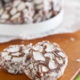 An old fashioned homemade candy - this Shaggy Dog Candy Recipe is perfect for the Christmas plate! Chocolate and marshmallows are rolled in coconut in this decadent treat.