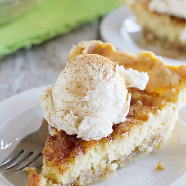 Pie meets snickerdoodle cookie in this addictive Snickerdoodle Pie. A pie crust is topped with a soft snickerdoodle cookie center and a cinnamon caramel sauce. Serve with ice cream for a delicious dessert!