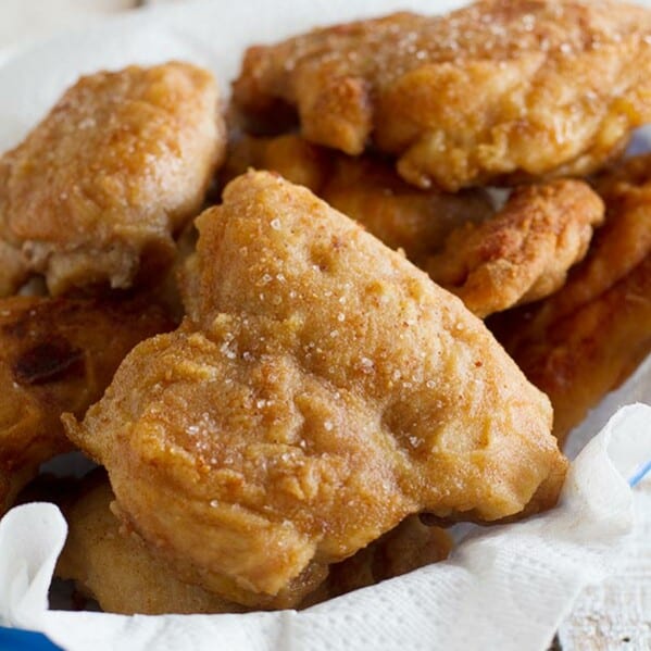 Chicken thighs are coated in a thin powdered peanut butter and flour coating in this Georgia Peanut Fried Chicken that is not your typical fried chicken recipe!