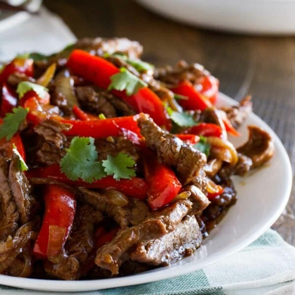 Steak Stir Fry Recipe with Peppers topped with cilantro