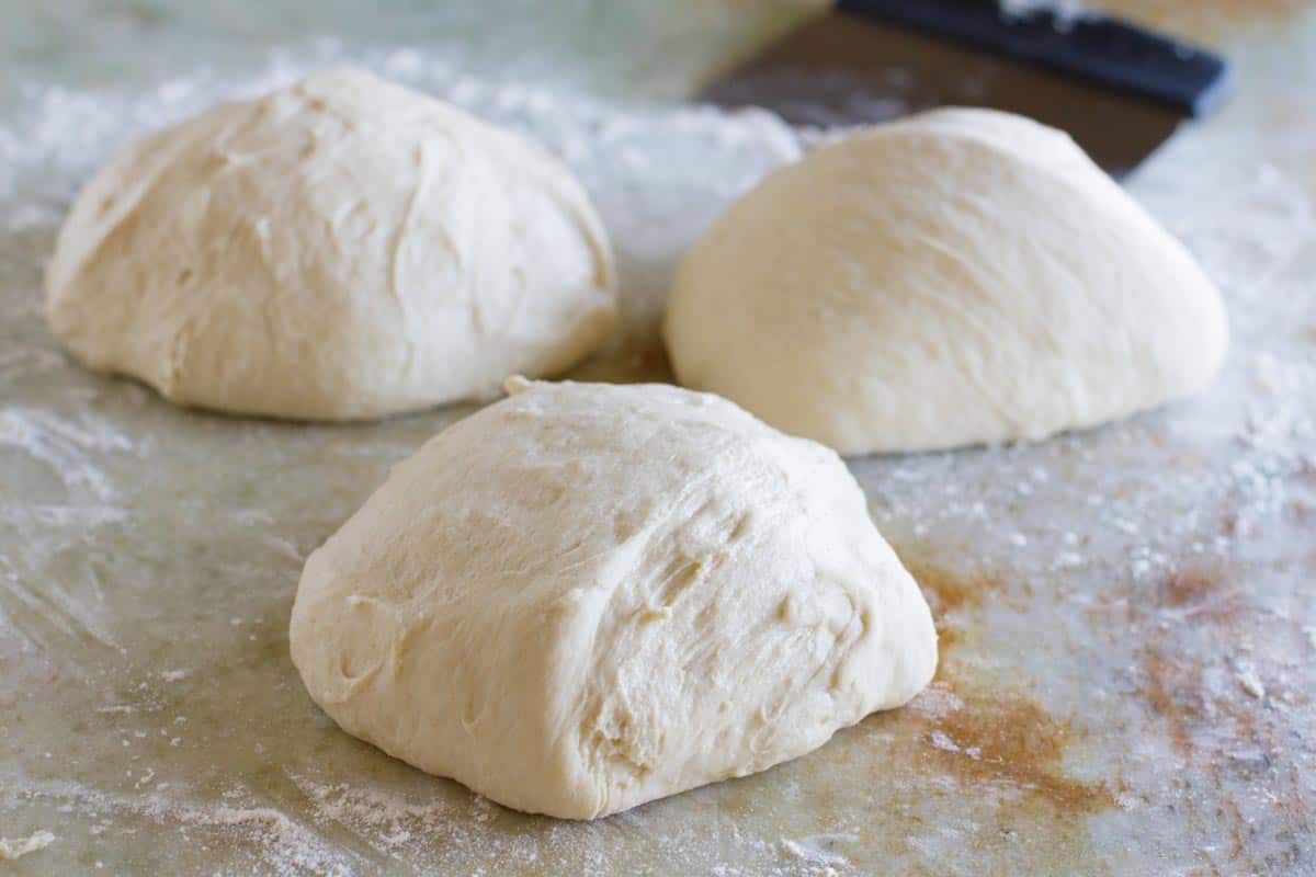 three balls of pizza dough