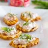 Have fun with your food with these Tomato Basil Waffle Fry Crostini!