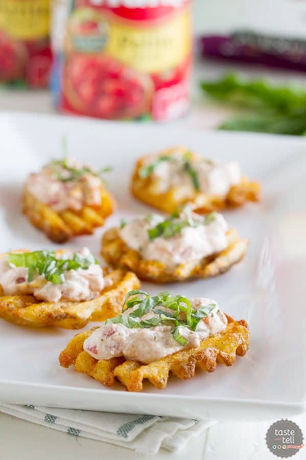 Have fun with your food with these Tomato Basil Waffle Fry Crostini!