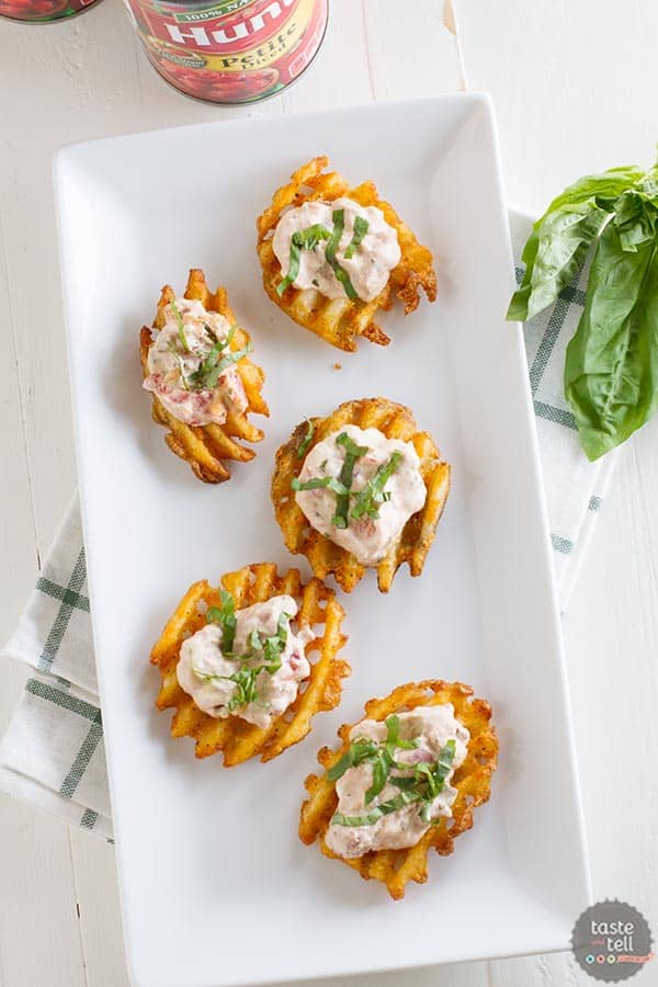 Tomato Basil Waffle Fry Crostini - and addictive and delicious appetizer.