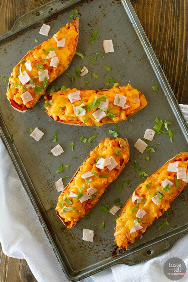 Twice Baked Sweet Potatoes with Cheddar and Canadian Bacon on www.tasteandtellblog.com