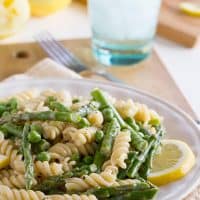 A light citrus flavor brightens this silky cream sauce in this Lemon Cream Sauce Pasta with Asparagus and Peas.