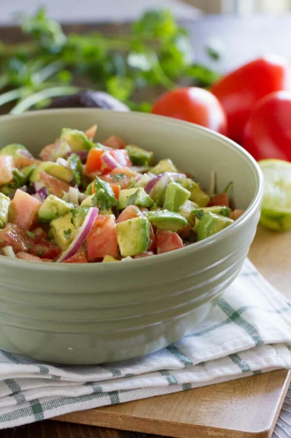 Fresh and bright, this Avocado and Tomato Salad is a perfect side dish alongside any Mexican themed meal. It’s also a great pot-luck salad!