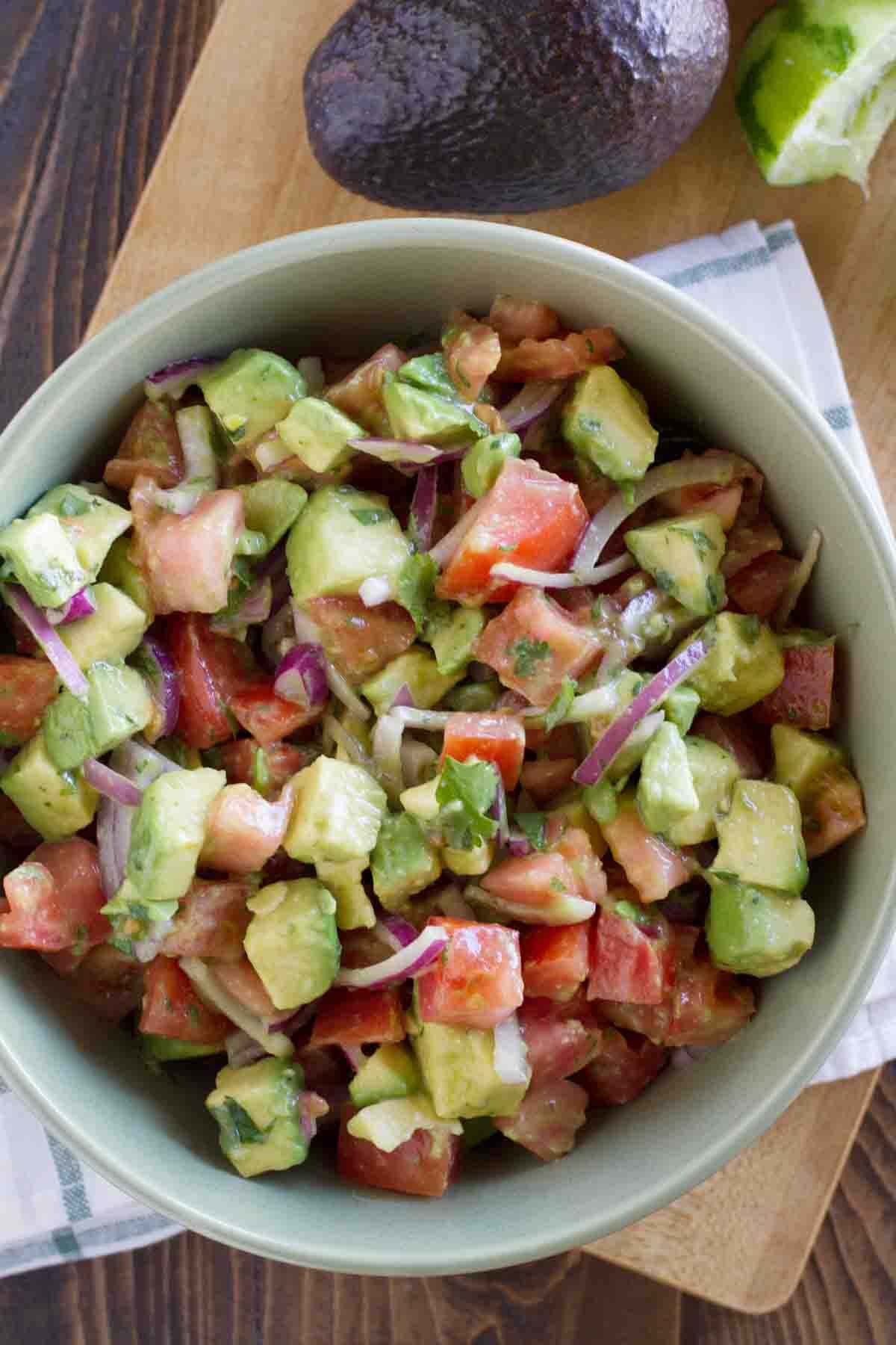 overhead view of avocado and tomato salad