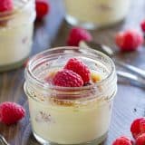 A creamy and delicious creme brûlée recipe has fresh raspberries mixed in for a tasty change on a classic.