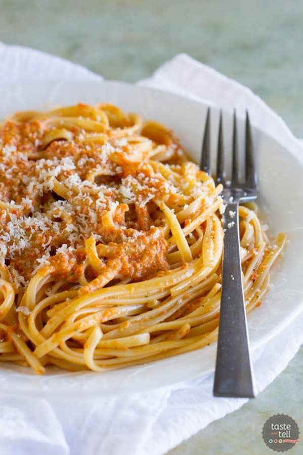 A roasted red pepper pesto is the star in this easy vegetarian pasta dinner. This Roasted Red Pepper Pesto Linguine is easy enough for a weeknight, but fancy enough for a special dinner.